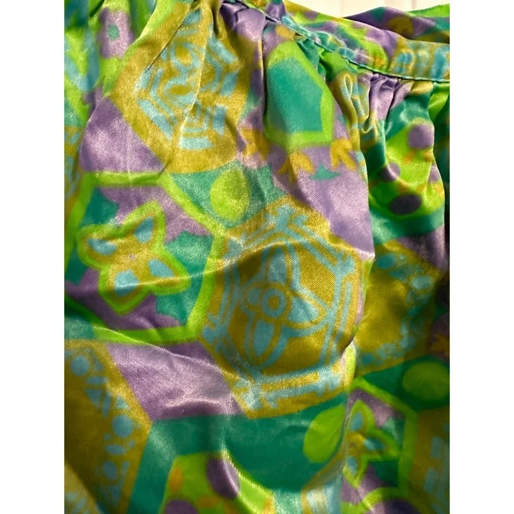 Vintage shiny green and purple 70s psychedelic print apron